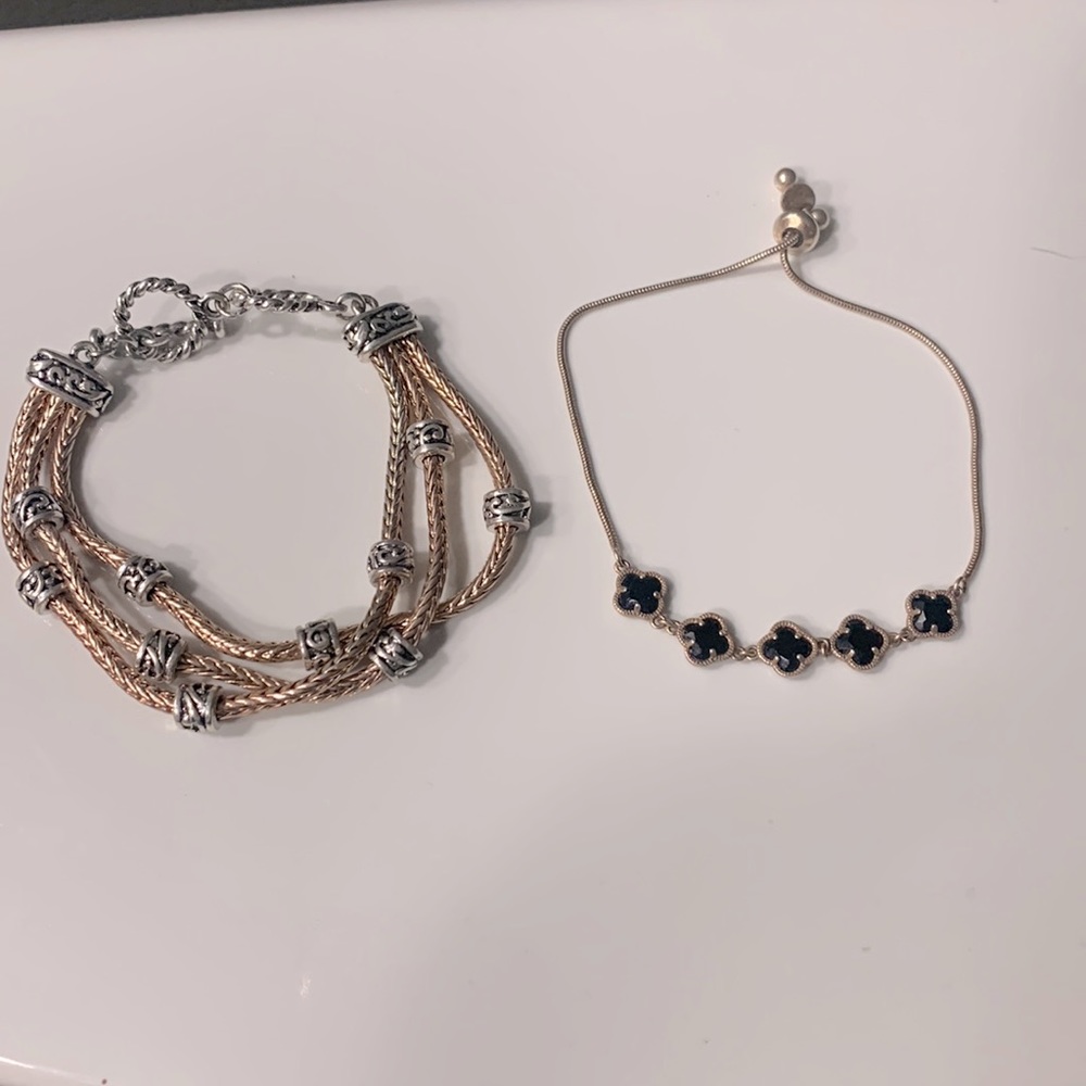 Two rose gold accent bracelets. Dress up or down.